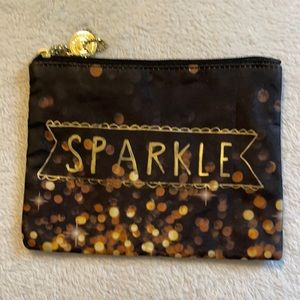 Sparkle.  Small make up bag